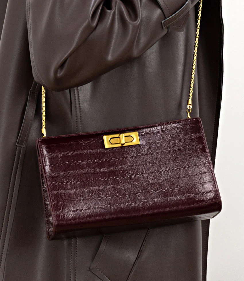 NAYLA Bag with Twist Hardware in Black Cherry Eel Print - Image 6